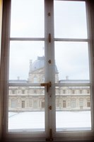 Louvre museum viewed through a window, Paris, Ile-de-France, France Fine Art Print