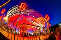 Time exposure of a Carnival ride at night Fine Art Print