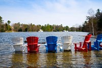 Adirondack chairs partially submerged in the Lake Muskoka, Ontario, Canada Fine Art Print