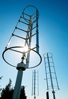 Low angle view of vertical windmills Fine Art Print