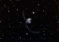 Antennae (NGC 4038 and 4039), interacting pair of galaxies in Corvus Fine Art Print