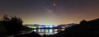 Lunar eclipse and Milky Way above Taleqan Lake, Iran Fine Art Print