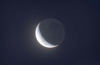 Waxing crescent moon with Earthshine Fine Art Print