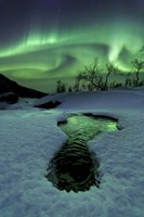 Aurora Borealis over a frozen river, Norway Fine Art Print