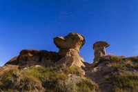 Starry sky above hoodoo formations at Dinosaur Provincial Park, Canada Fine Art Print