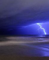 A bolt of lightning from an approaching storm in Miramar, Argentina Fine Art Print