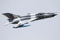 A Romanian Air Force MiG-21 Lancer over Romania Fine Art Print