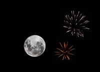 A composite image with fireworks and a new Moon Fine Art Print