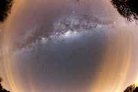 The Milky Way at zenital position with some thin clouds at the horizon Fine Art Print