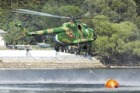 Bulgarian Air Force Mi-17 taking water with Bambi Bucket Fine Art Print