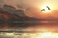 Two Bald Eagles fly along a mountainous coastline at sunset Fine Art Print