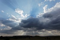 Light beams  through clouds, Maasai Mara, Kenya Fine Art Print