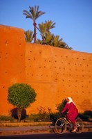 Veiled Woman Bicycling Below Red City Walls, Marrakech, Morocco Fine Art Print