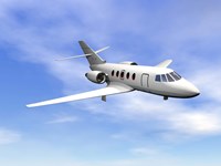 Private jet plane flying in cloudy blue sky Fine Art Print