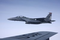 US Air Force F-15E Strike Eagle over the wing of a KC-135 Stratotanker by Daniel Karlsson - various sizes, FulcrumGallery.com brand