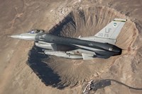 F-16C Fighting Falcon flying above Arizona's Meteor Crater Fine Art Print