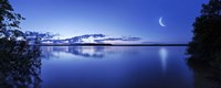 Moon rising over tranquil lake against moody sky, Mozhaisk, Russia Fine Art Print