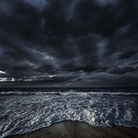 Rough seaside against stormy clouds, Hersonissos, Crete, Greece Fine Art Print