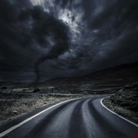 Tornado near a winding road in the mountains, Crete, Greece Fine Art Print