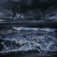 Tornados in a rough sea against stormy clouds, Crete, Greece Fine Art Print
