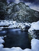 A river flowing through the snowy mountains of Ritsa Nature Reserve, Abkhazia Fine Art Print