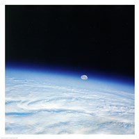 Outer space shot of storm system in early stage of formation with moon in background Fine Art Print