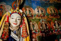 Religious statue infront of Buddha mural at Shey Palace, Ladakh, India Fine Art Print