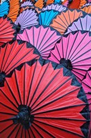 Pattern of newly assembled decorative umbrellas drying in sun, Umbrella Making Center, Bo Sang, near Chiang Mai, Thailand. Fine Art Print