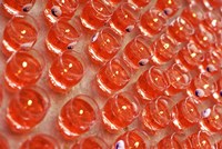 Malaysia, several offering light in a Buddhist temple Fine Art Print