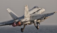 F/A-18C Hornet Taking Off from USS George HW Bush Fine Art Print