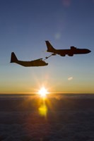 MC-130H Combat Talon II Being Refueled by a KC-135R Stratotanker at Sunset Fine Art Print