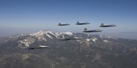 F-22 Raptors Over New Mexico Mountains Fine Art Print