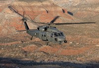 HH-60G Pave Hawk Flies a Low Level Route in New Mexico Mountains Fine Art Print