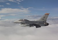 F-16 Fighting Falcon Flies with AGM-65 Maverick Missile Fine Art Print
