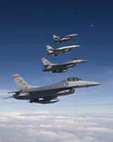Four F-16's Fly in Formation During a Training Mission Fine Art Print