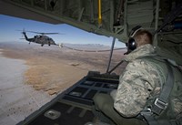 Loadmaster on an HC-130 Watches a HH-60G Pave Hawk Refuel Fine Art Print