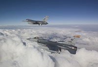 Two F-16's flying in the Clouds Fine Art Print