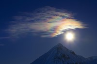 Full Moon with Rainbow Clouds at Ogilvie Mountains Fine Art Print