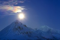 Full moon with Rainbow Clouds over Ogilvie Mountains, Canada Fine Art Print