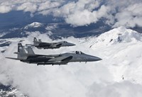 Two F-15 Eagles Fly Past Snow Capped Peaks in Central Oregon Fine Art Print