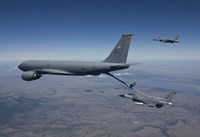 Two F-16 Fighting Falcons Conduct Aerial Refueling with KC-135 Stratotanker Fine Art Print