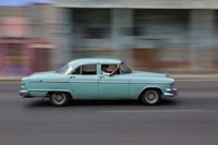 1950's era car in motion, Havana, Cuba Fine Art Print