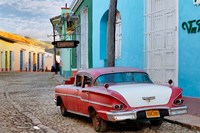 Colorful buildings and 1958 Chevrolet Biscayne, Trinidad, Cuba Fine Art Print