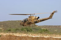 An AH-1S Tzefa attack helicopter of the Israeli Air Force Fine Art Print