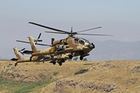 Two AH-64A Peten attack helicopters of the Israeli Air Force Fine Art Print