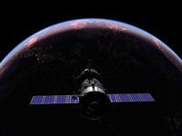 A Soyuz TMA-M spacecraft soars over the Atlantic Ocean at sunset Fine Art Print