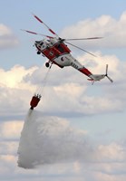 A Sokol W-3A Helicopter of the Czech Air Force with a Water Bucket Fine Art Print