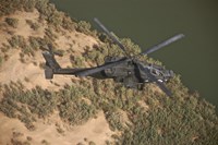 An AH-64D Apache Helicopter in Flight Fine Art Print