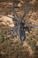 An AH-64D Apache Flying over Northern Iraq Fine Art Print