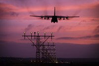 A C-130J Super Hercules landing at Ramstein Air Base, Germany Fine Art Print